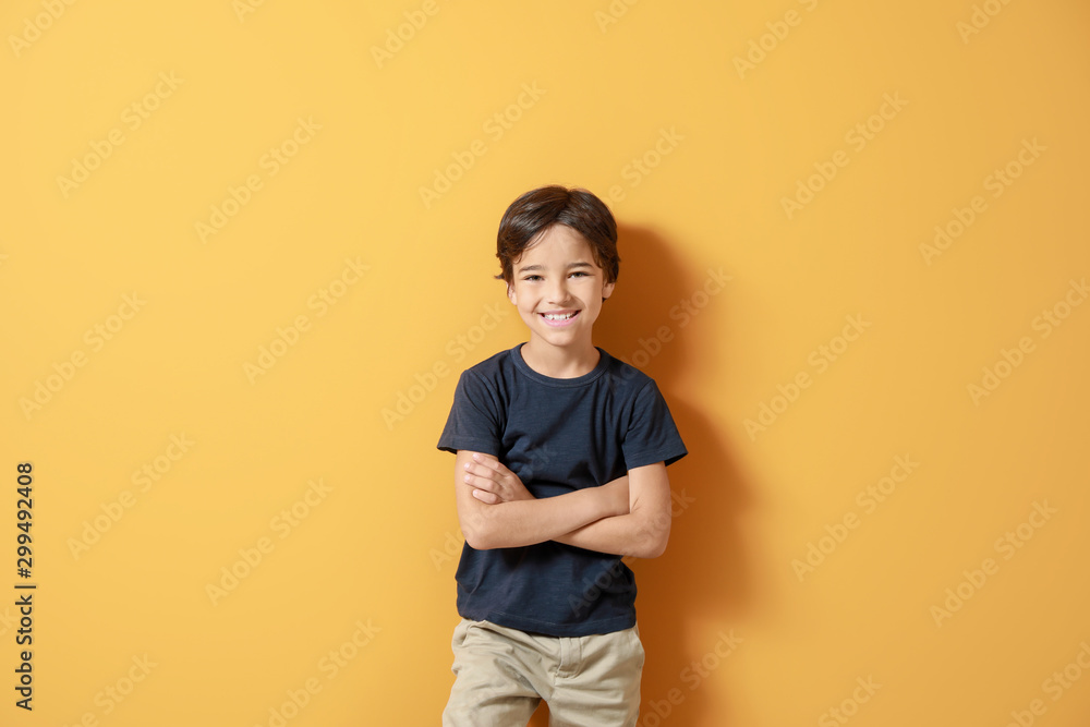 Cute little boy on color background - obrazy, fototapety, plakaty 