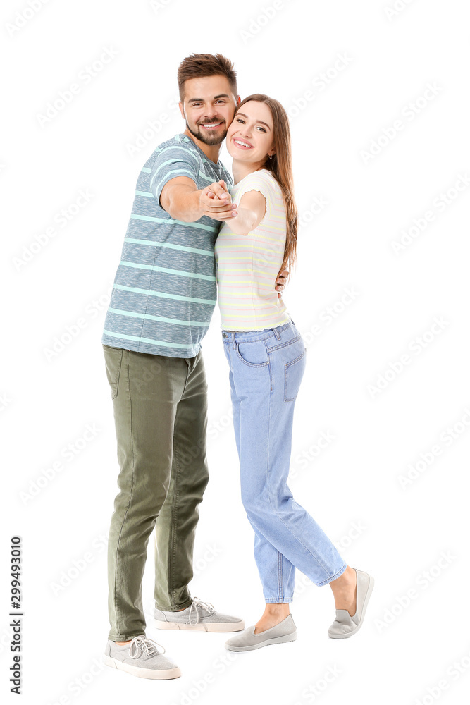 Portrait of dancing young couple on white background Portrait of dancing young couple on white background