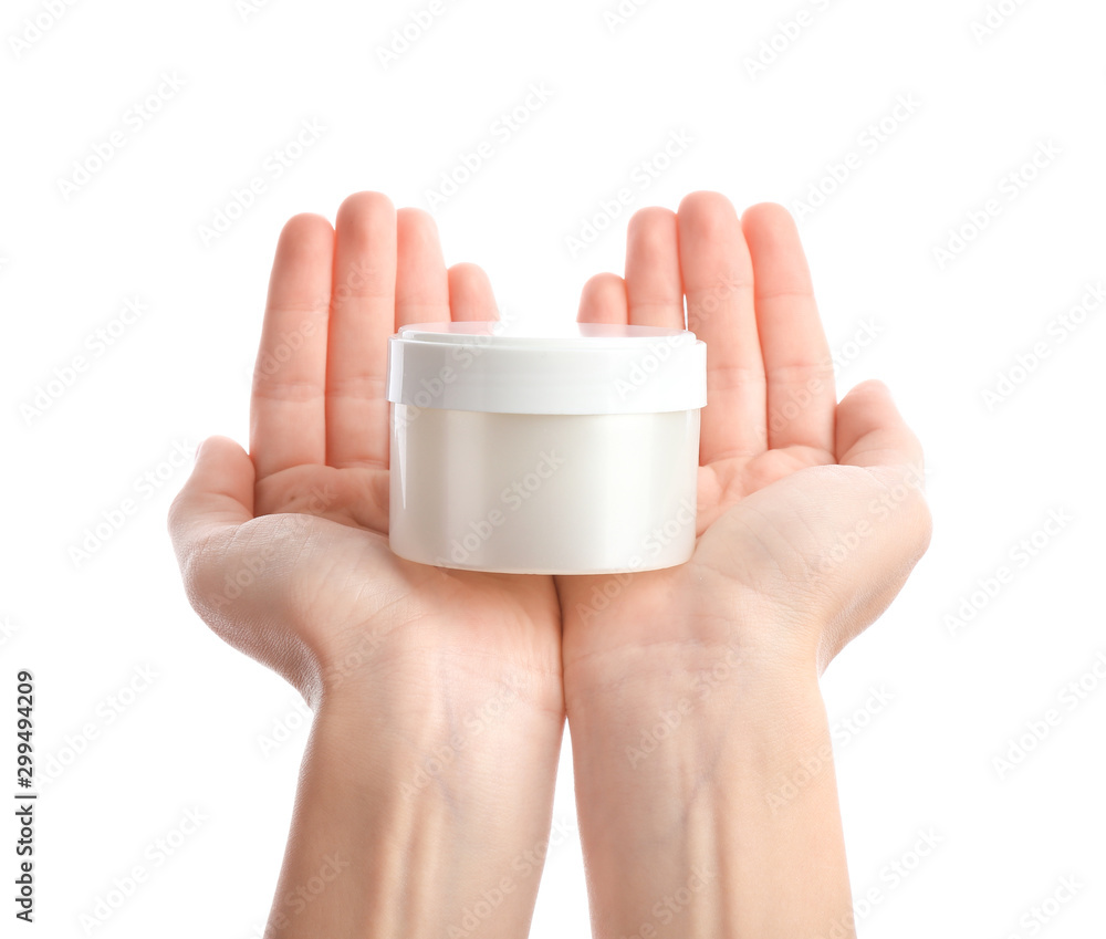 Hands of young woman with cream on white background Hands of young woman with cream on white background