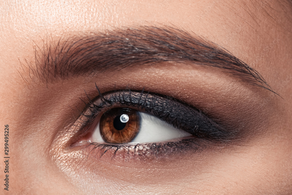 Young woman with beautiful eyebrows, closeup Young woman with beautiful eyebrows, closeup