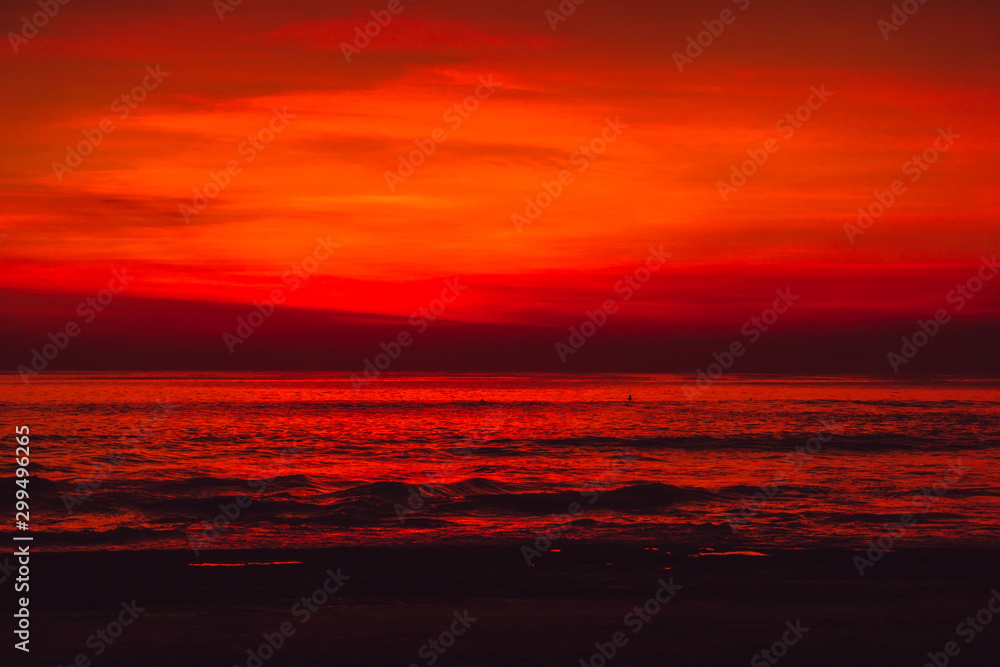 Bright colorful sunset  with clouds in Bali and ocean