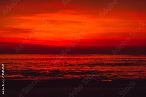Fototapeta Naklejka Na Ścianę i Meble -  Bright colorful sunset  with clouds in Bali and ocean