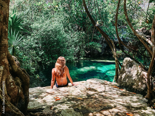 Women relax in cenote