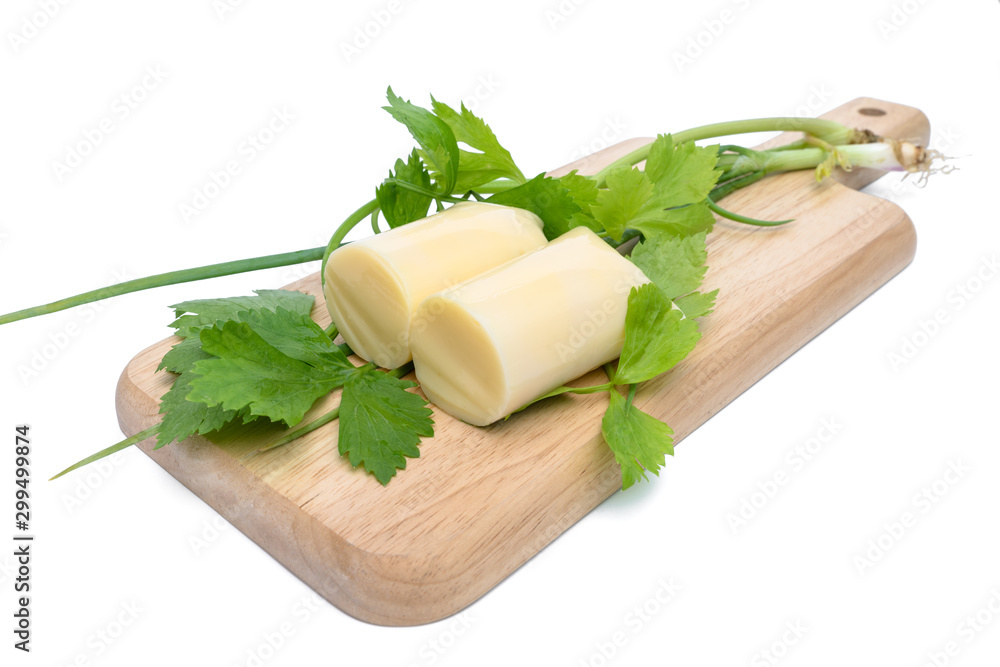 Tofu eggs and Vegetable on cutting board,isolated on white background Tofu eggs and Vegetable on cutting board,isolated on white background