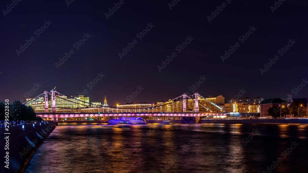 Crimean bridge illuminated at night in Moscow