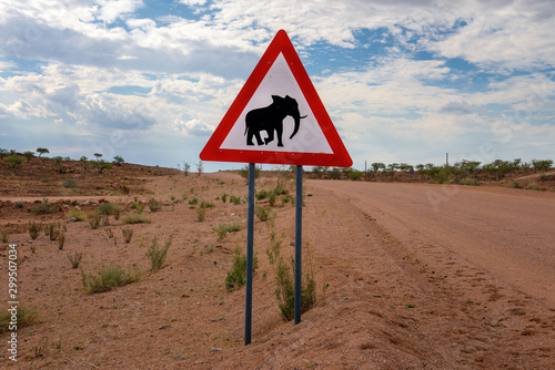 Elephant crossing warning road sign placed in the desert of Namibia