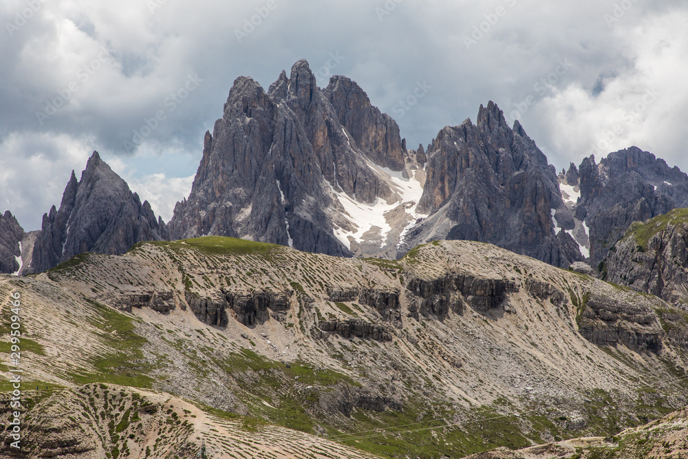 Dolomites, Italy - July, 2019: Amazing panoramic view from Tre Cime over the Dolomite's mountain chain