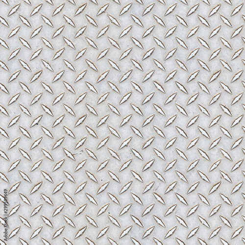 Seamless texture of stainless steel floor plate with bumped diamond patterrn. New York. USA.