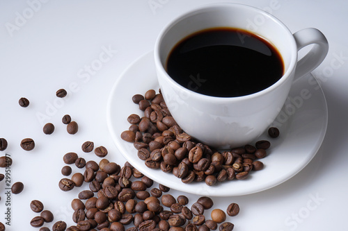cup of coffee and coffee beans with space