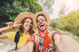 Couple travel and take a selfie on vacation 