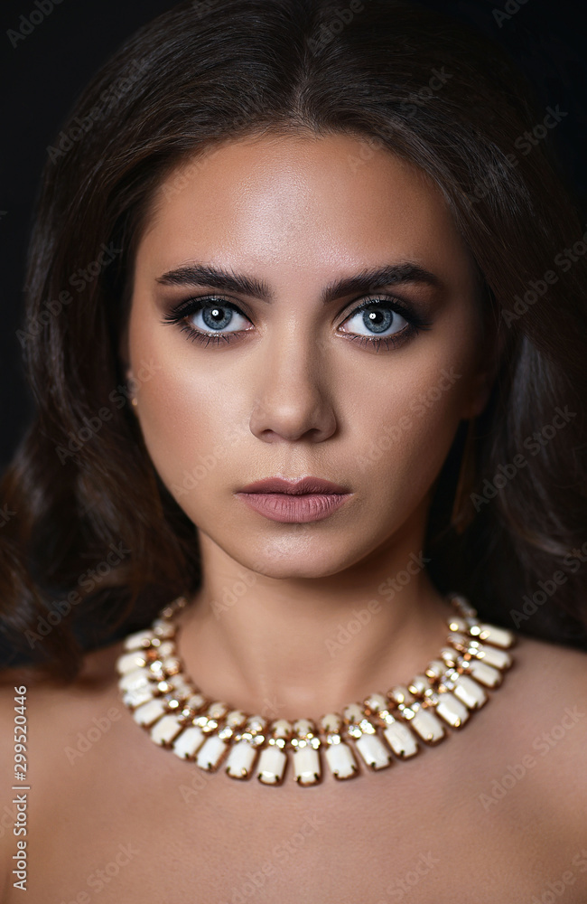 Fashion Art Portrait Of Beautiful Girl. Vogue Style Woman. Hairstyle. Black Hair and Nails. Isolated on Black Background. Beauty Stylish Model Portrait Fashion Art Portrait Of Beautiful Girl. Vogue Style Woman. Hairstyle. Black Hair and Nails. Isolated on Black Background. Beauty Stylish Model Portrait