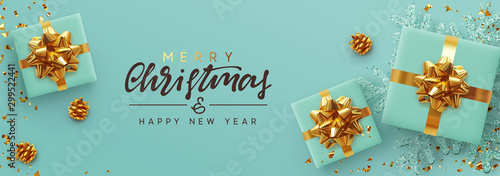 Christmas banner. Background Xmas design of realistic gifts box, blue snowflake and glitter gold confetti. Horizontal poster, greeting card, headers, website. Decoration objects flat lay, top view