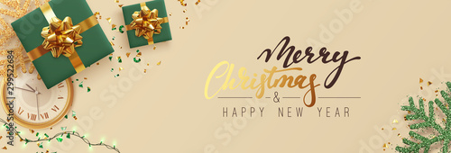 Holiday background Merry Christmas and Happy New Year. Xmas design with realistic festive objects, sparkling lights garland, green gift box, golden snowflake , glitter gold confetti. Horizontal banner