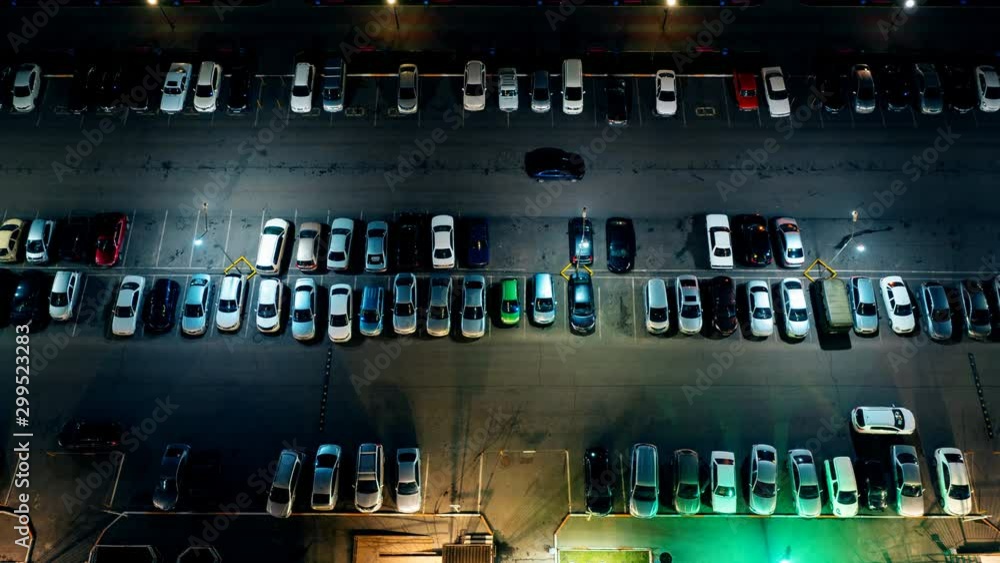 the movement of cars in the Parking lot at night, timelapse the movement of cars in the Parking lot at night, timelapse