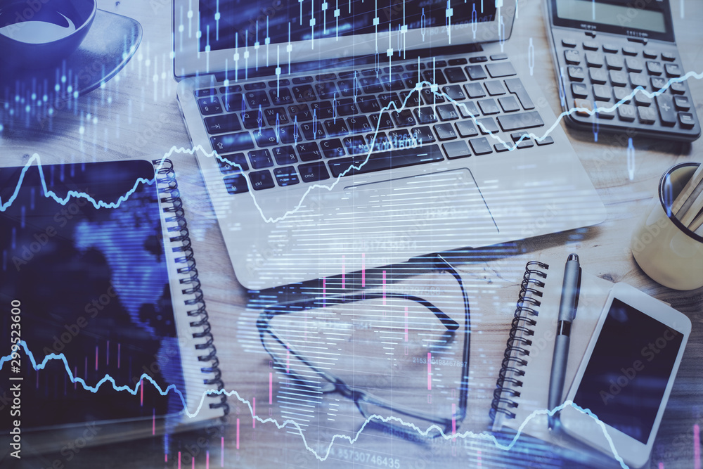 Stock market graph and table with computer background. Multi exposure. Concept of financial analysis. Stock market graph and table with computer background. Multi exposure. Concept of financial analysis.