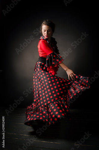 Canvastavla Carmen beautiful woman in red dress on dark background