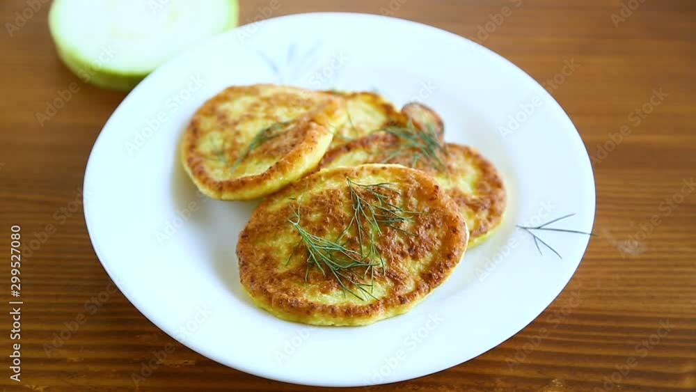 vegetable fritters made from green zucchini in a plate vegetable fritters made from green zucchini in a plate