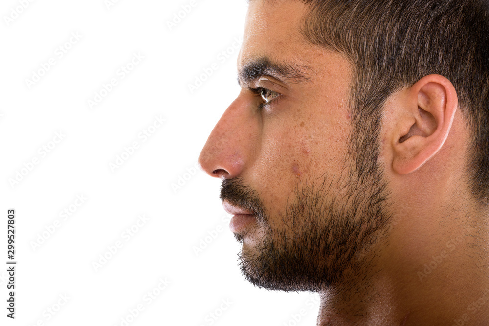 Close up profile view of young Persian man Close up profile view of young Persian man