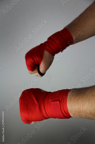 boxer hands in red bandage, sports concept © kittyfly