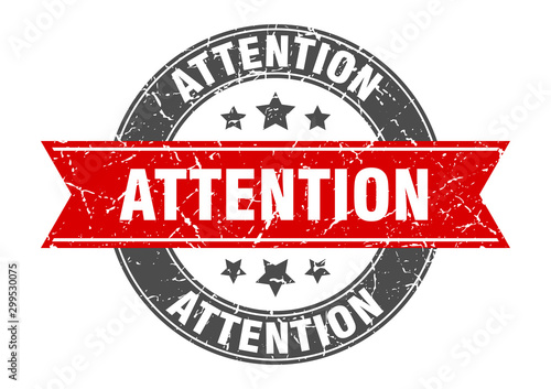 attention round stamp with red ribbon. attention