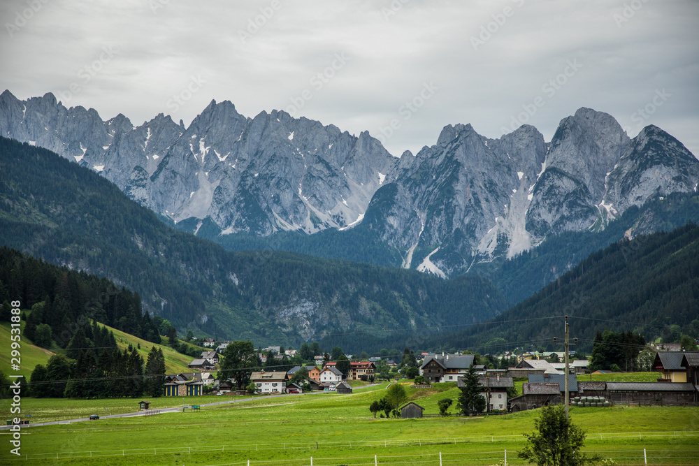 Austria - July, 2019: Country road in the alps village in Austria