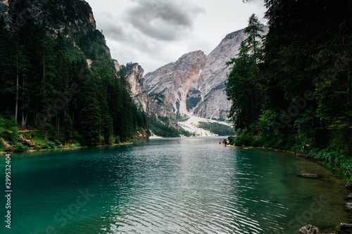 Dolomites, Italy - July, 2019: Spectacular romantic place with typical wooden boats on the alpine lake, Braies lake,Dolomites,South Tyrol,Italy,Europe