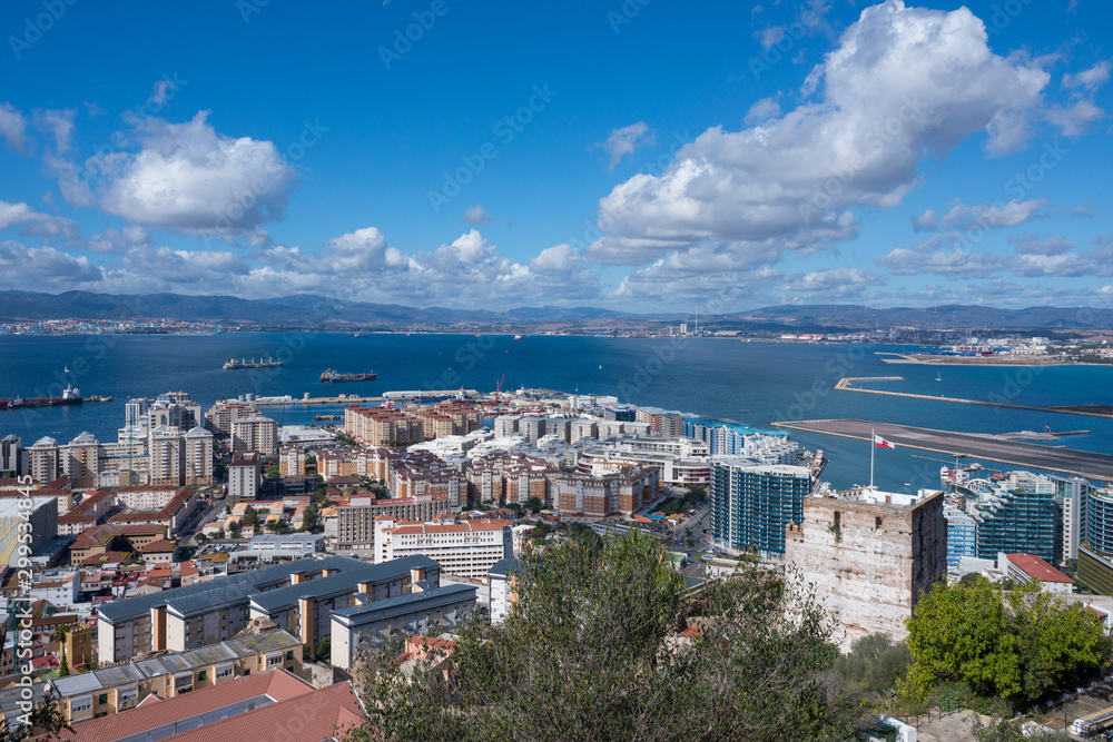 Gibraltar city view from the rock with a sunny day with beautiful clouds and sea views