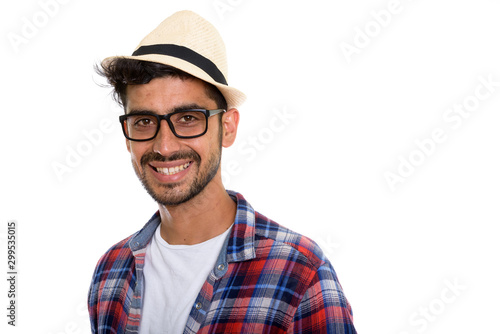 Portrait of young bearded Persian tourist man with eyeglasses