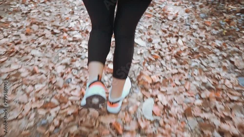 Beauty woman is run away on forest from suspect, maniac. Crime concept, Victim girls are flee behind trees. Girls need help, scary, alone, horror concept. 
