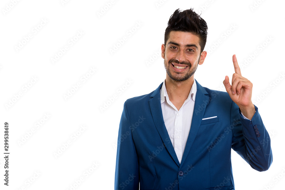 Young handsome bearded Persian businessman in suit Young handsome bearded Persian businessman in suit