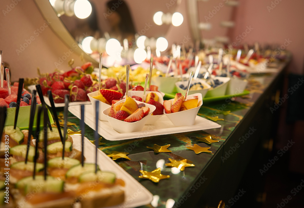 Many delicious snacks are on the table. Opening Celebration