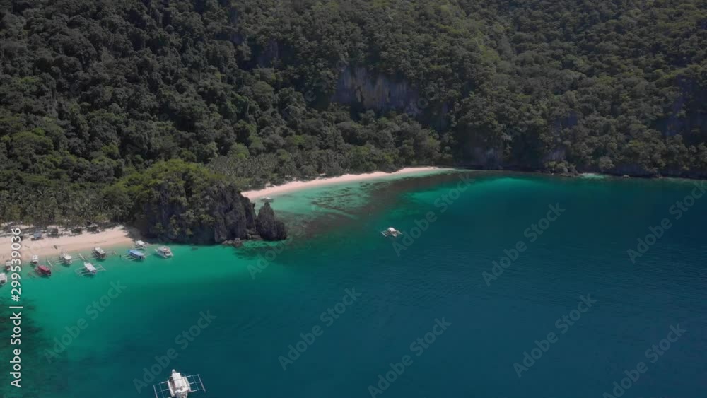 Beautiful Seven Commandos Beach in El Nido, Palawan, drone shot of the nature in Philippines Beautiful Seven Commandos Beach in El Nido, Palawan, drone shot of the nature in Philippines