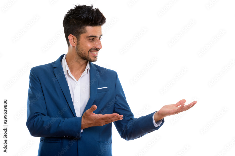 Young handsome bearded Persian businessman in suit Young handsome bearded Persian businessman in suit
