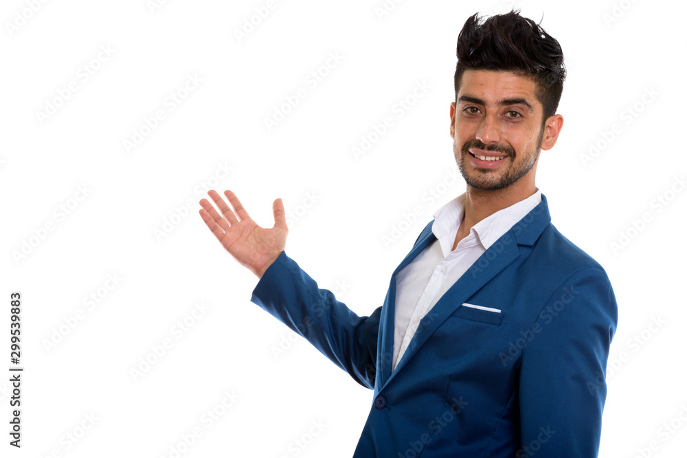 Young handsome bearded Persian businessman in suit Young handsome bearded Persian businessman in suit