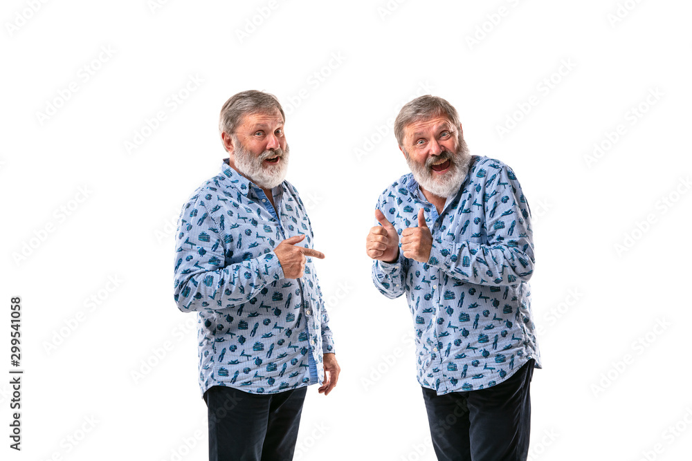 Senior man arguing with himself on white studio background. Concept of human emotions, expression, mental issues, internal conflict, split personality. Half-length portrait. Negative space. Thumb up. Senior man arguing with himself on white studio background. Concept of human emotions, expression, mental issues, internal conflict, split personality. Half-length portrait. Negative space. Thumb up.