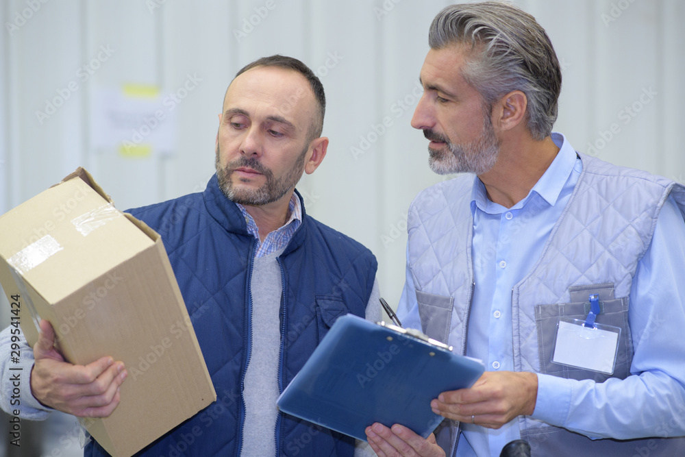courier holding a clipboard courier holding a clipboard