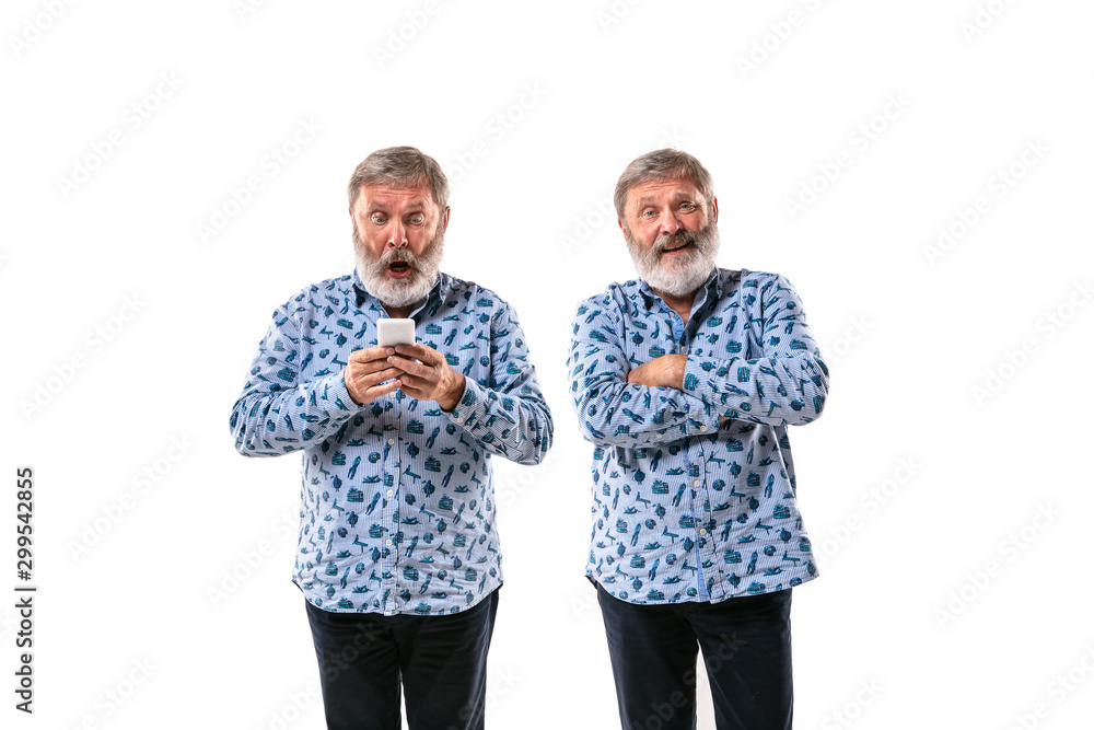 Senior man arguing with himself on white studio background. Concept of human emotions, expression, mental issues, internal conflict, split personality. Half-length portrait. Negative space. Confident. Senior man arguing with himself on white studio background. Concept of human emotions, expression, mental issues, internal conflict, split personality. Half-length portrait. Negative space. Confident.