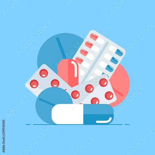 set of pills on a blue background