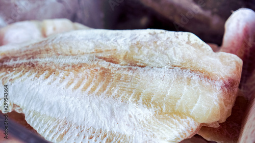 Fresh frozen pangasius fish at shop refregerator