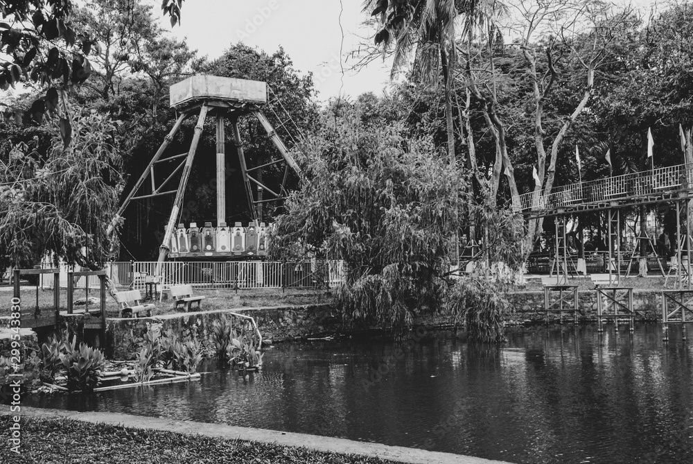 Obraz premium Black and white picture of an abandoned and decaying amusement park in Da Nang, Vietnam 
