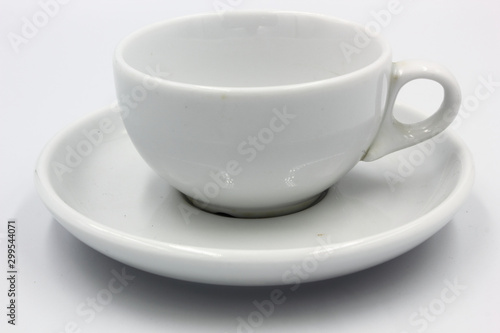 empty coffee cup and saucer isolated on white background