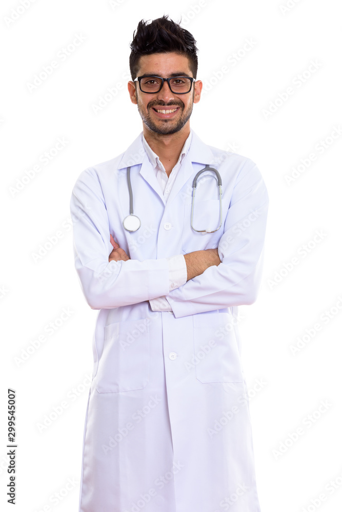 Young handsome bearded Persian man doctor with eyeglasses