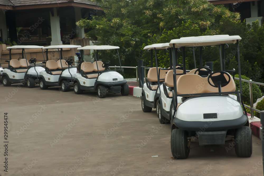 Golf carts in the parking lot
