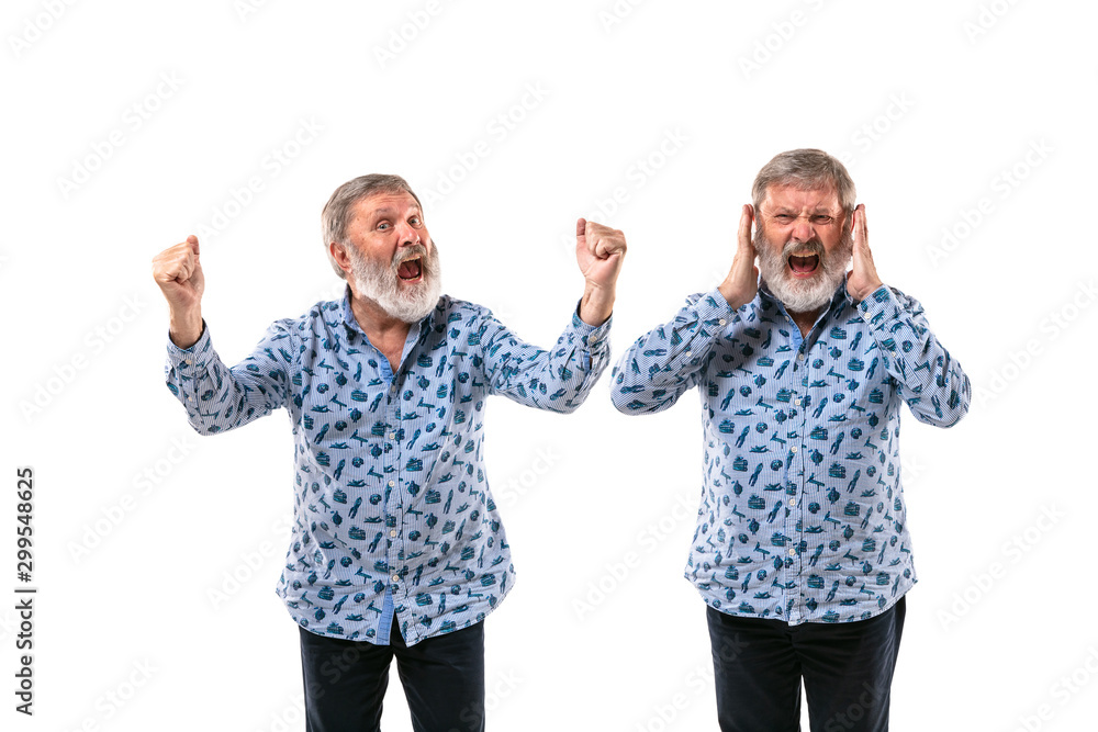 Senior man arguing with himself on white studio background. Concept of human emotions, expression, mental issues, internal conflict, split personality. Half-length portrait. Negative space. Winner. Senior man arguing with himself on white studio background. Concept of human emotions, expression, mental issues, internal conflict, split personality. Half-length portrait. Negative space. Winner.