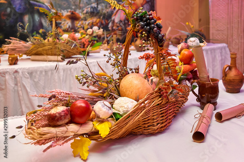 Fototapeta Naklejka Na Ścianę i Meble -  Still life basket of grapes with autumn vegetables