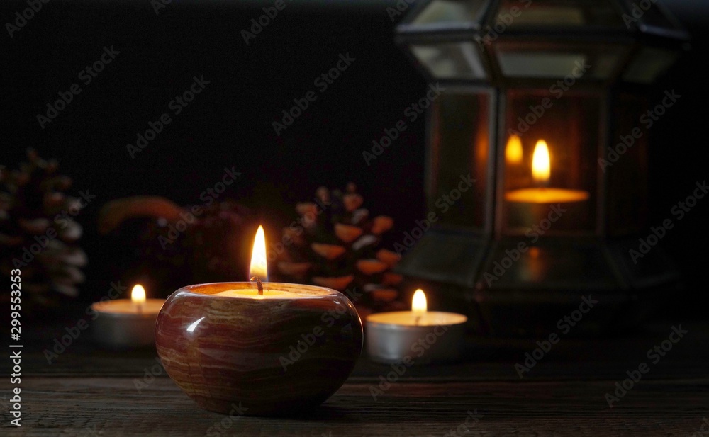 candle burning decoration as Christmas festival greeting  P By Phuangphet geissler