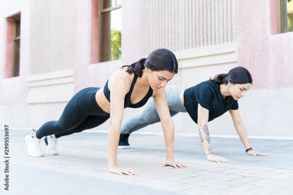 Attractive Young Women Doing Some Working Out Together Attractive Young Women Doing Some Working Out Together