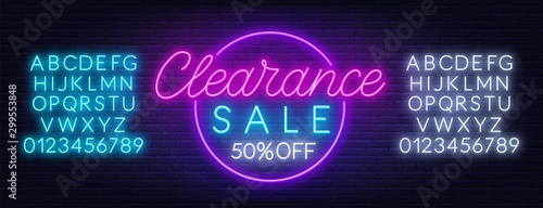 Clearance sale neon sign on dark background. Neon alphabet on a dark background. Template for design.