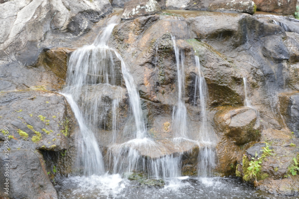 waterfall over rocks waterfall over rocks
