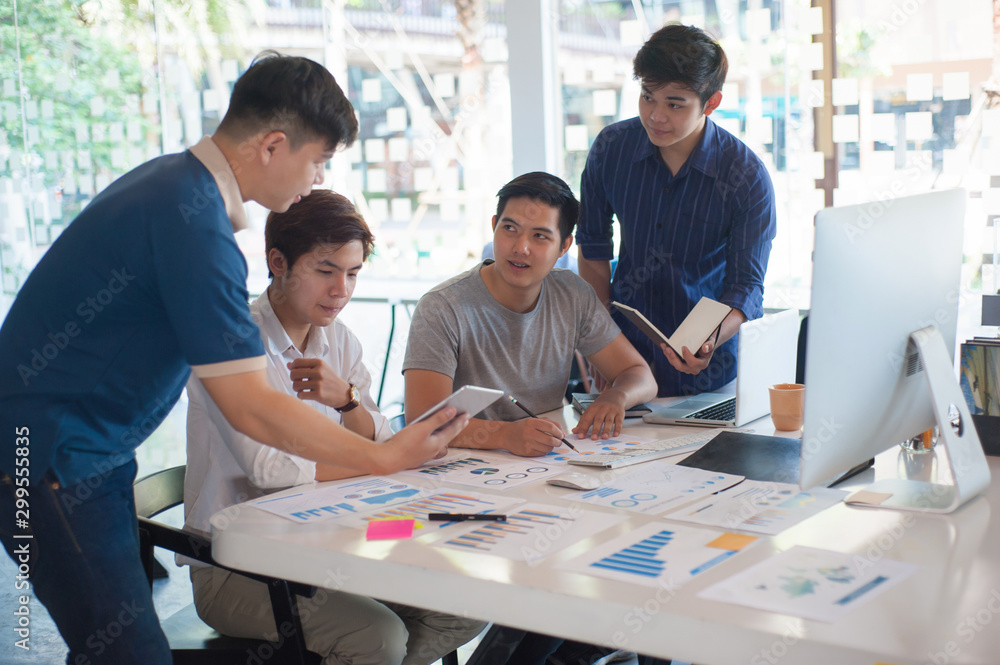 Young businessmen meet to brainstorm ideas for planning a startup business project. Young businessmen meet to brainstorm ideas for planning a startup business project.